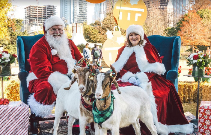 Santa &amp; Mrs. Claus at an event in city park